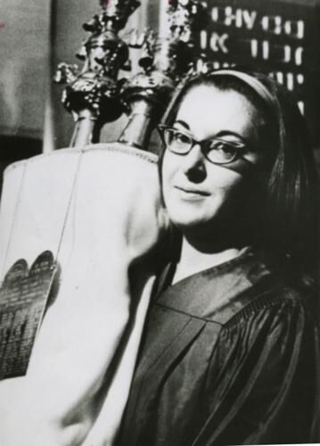 Priesand Torah looks at camera.image.jpeg